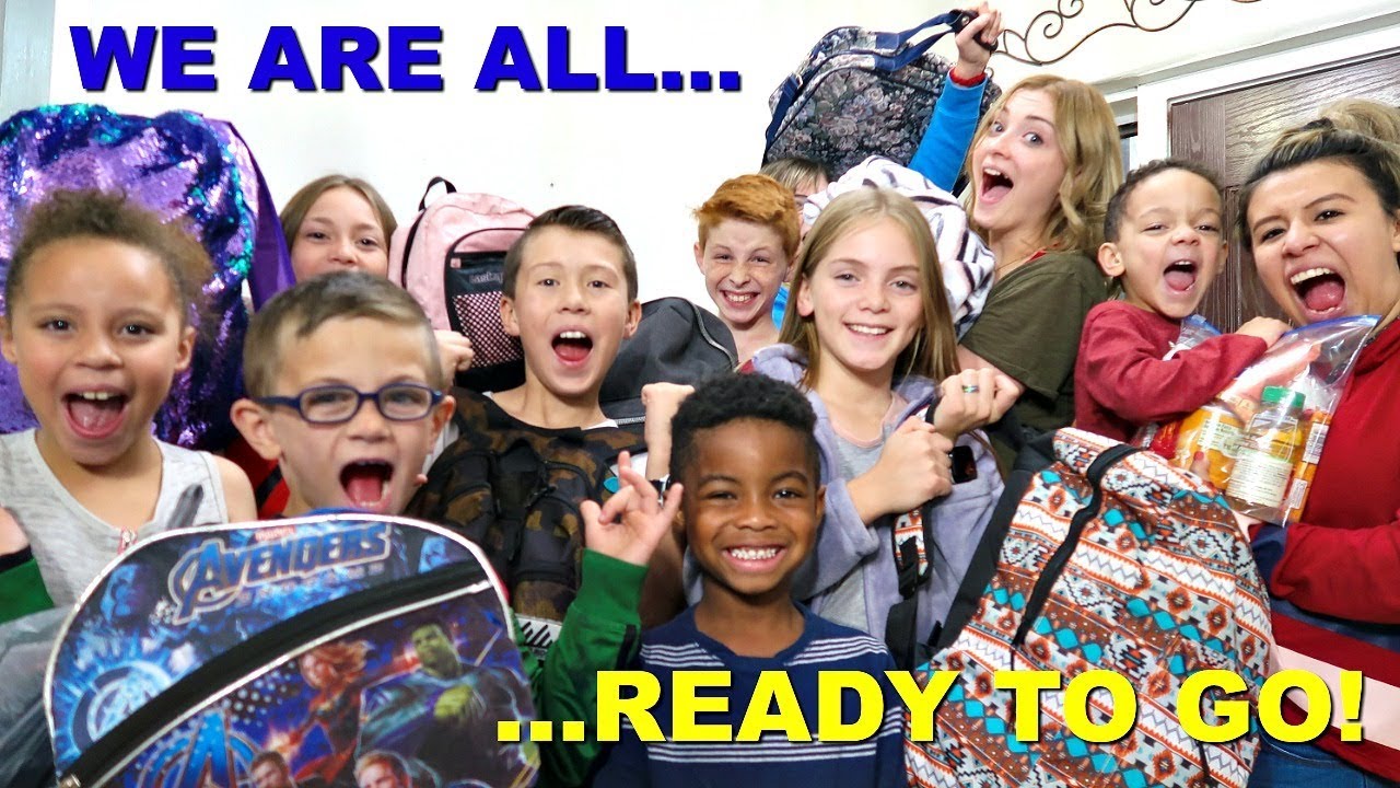 Packing our large family for a road trip! | Mystery YouTube channel!