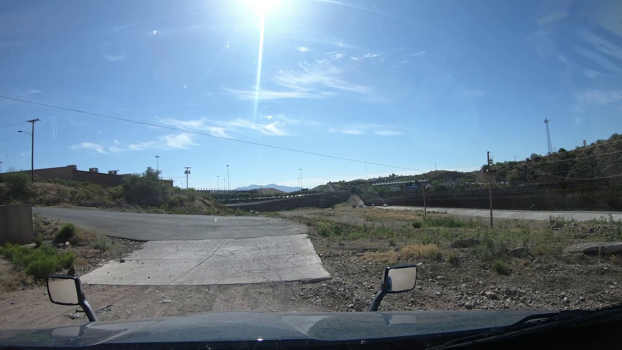 n freeport drive,nogales arizona.border wall covered with razor wire