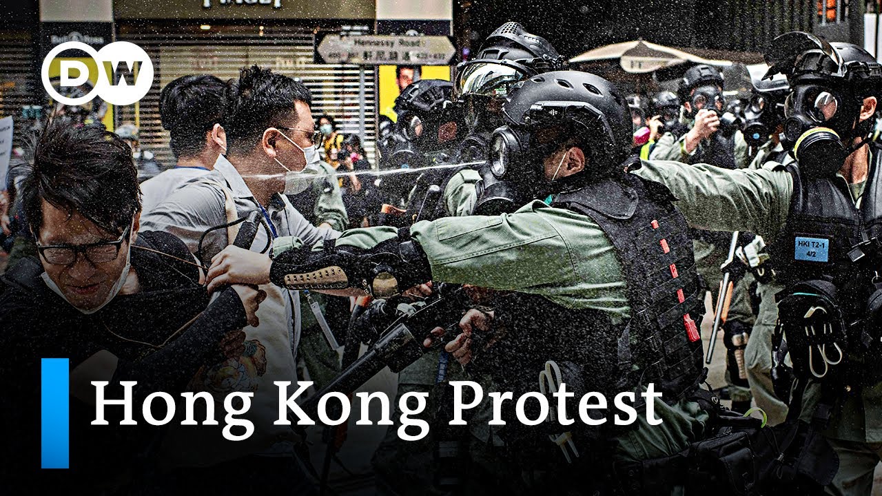 Hong Kong: Thousands defy lockdown orders to protest China's security law | DW News
