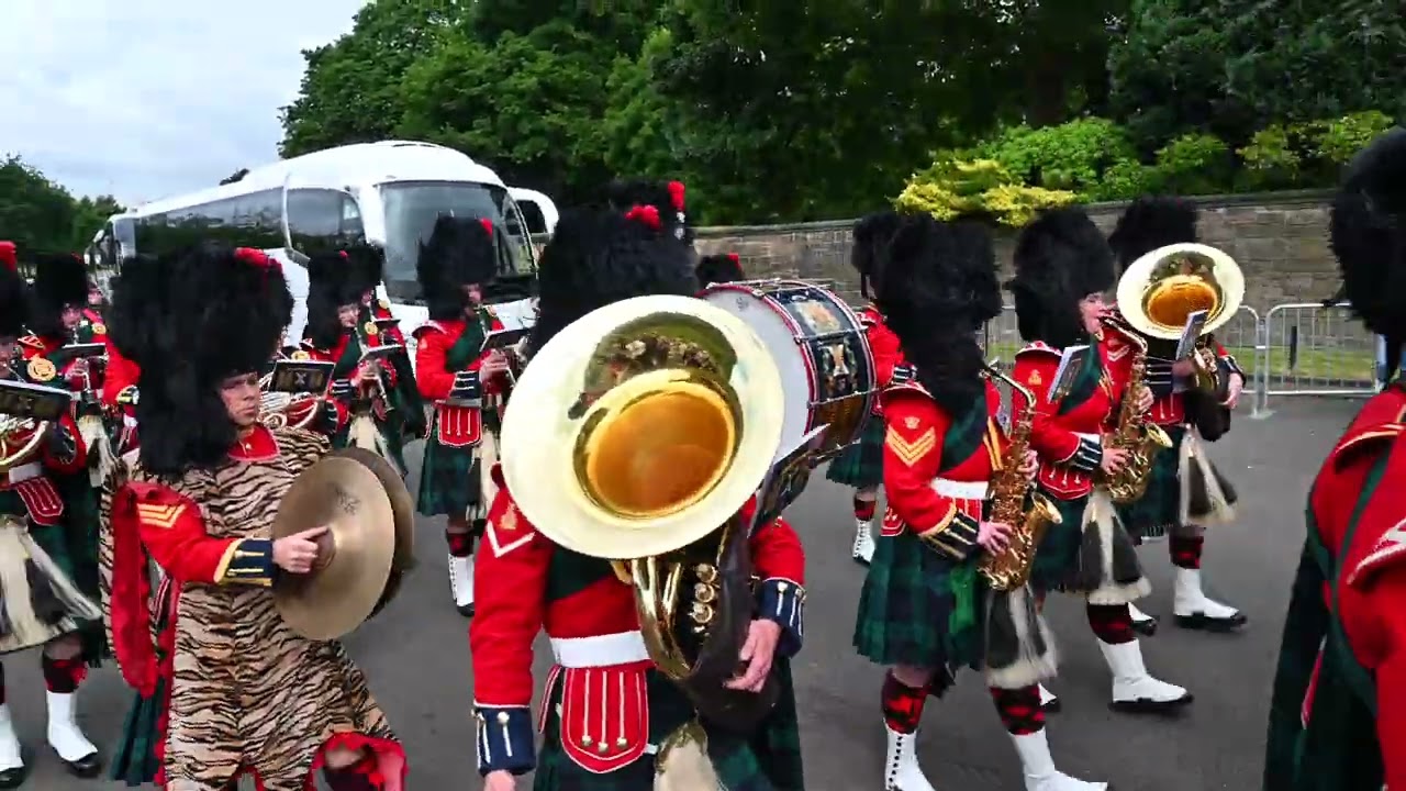 The Royal Regiment of Scotland march into Holyrood Palace to welcome the King and Queen