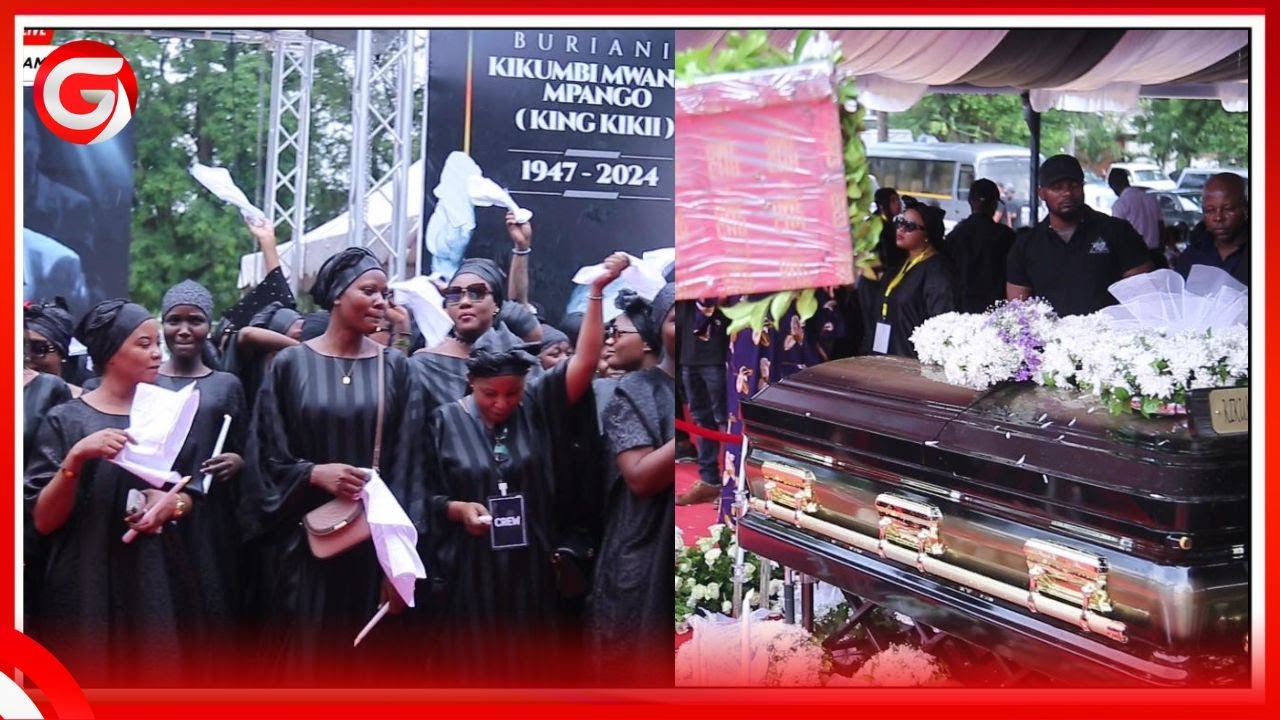 TAZAMA KITAMBAA CHEUPE YAPIGWA MBELE YA JENEZA LENYE MWILI WA MZEE KING KIKII MVUA IKINYESHA...