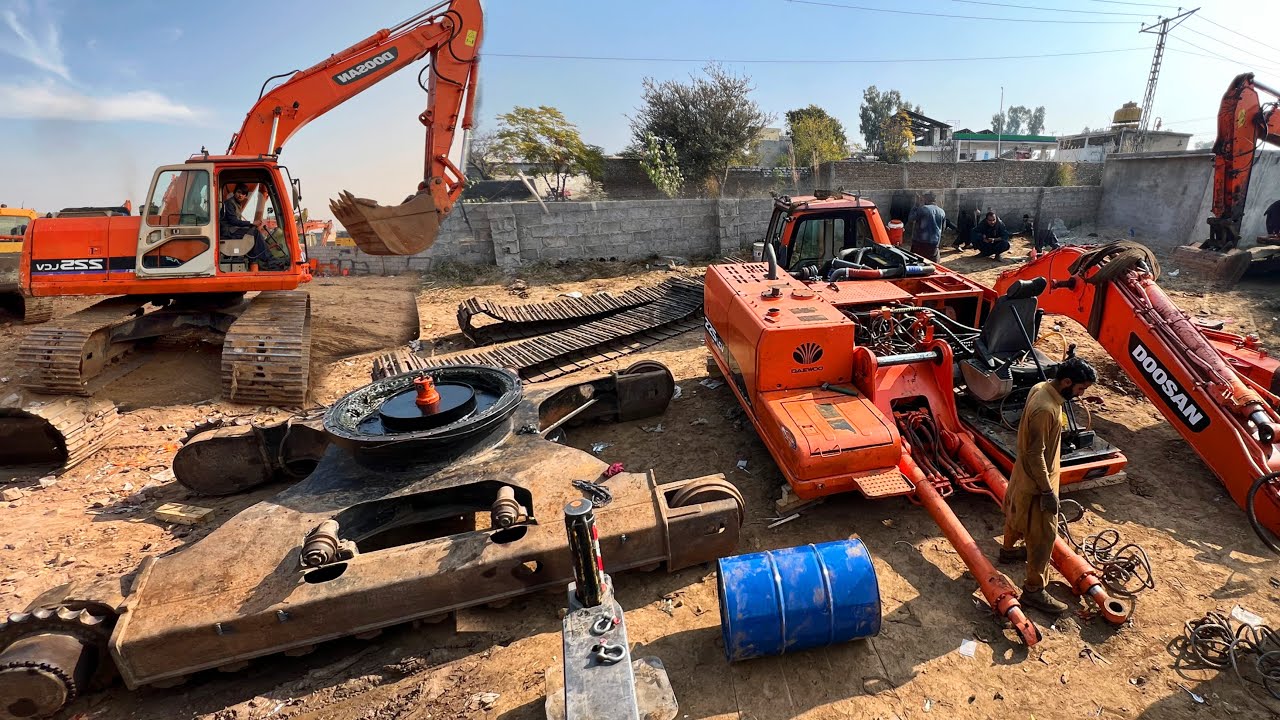 Skills of Pakistani Mechanics as They Assemble European Excavator Parts Into Heavy Duty Machines