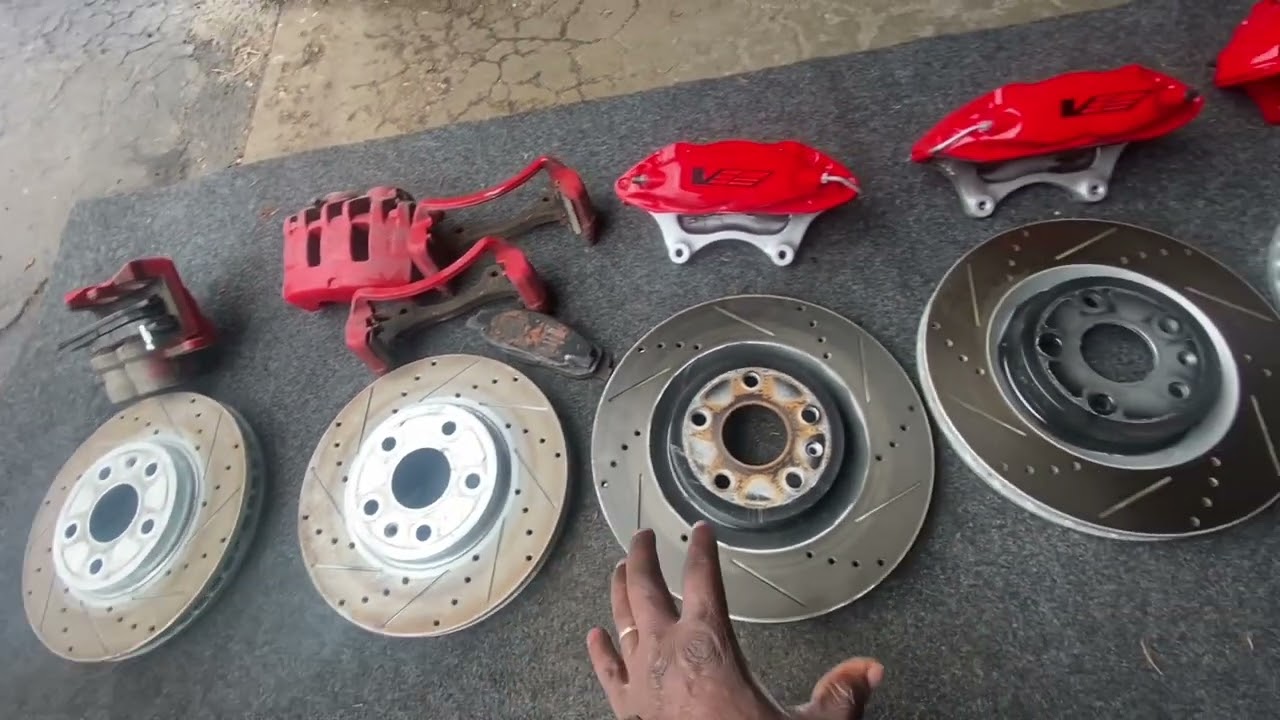 Brake caliper side-by-side comparison: OEM 2 piston vs 4 piston Brembo vs 6 piston