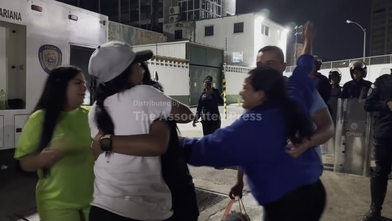 Tearful reunions as prisoners are released from a detention center in Caracas