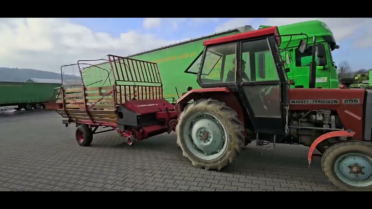 Odbiór przyczepy samozbierającej Pottinger z Agromaszu. Massey Ferguson 255