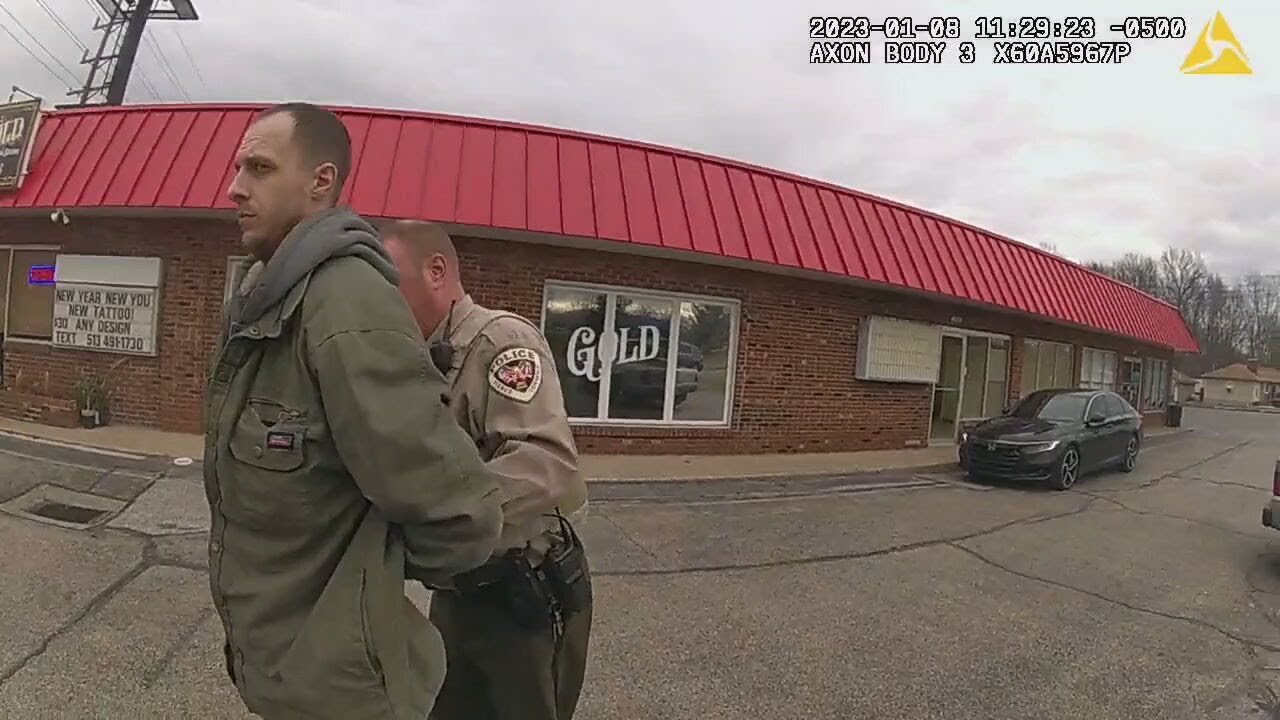 Body cam footage shows arrest of tattoo parlor murder suspect