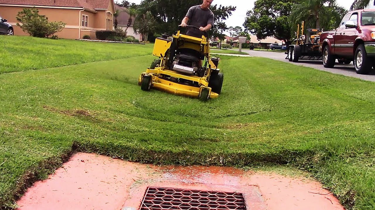 Mowing a very wet ditch - Great Dane Super Surfer!