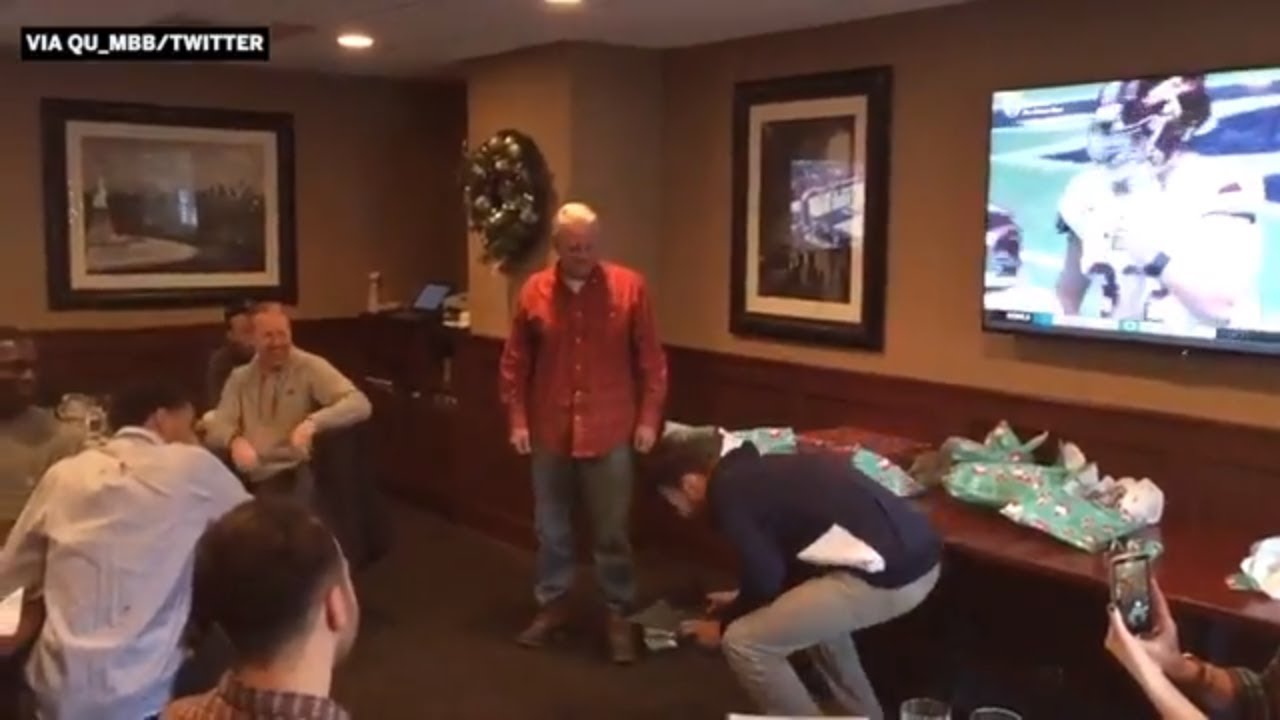 Quinnipiac basketball coach surprises player with scholarship during Secret Santa | ESPN
