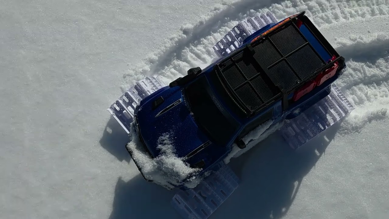 Traxxas trx4 tracks 3d printed on a non high trail