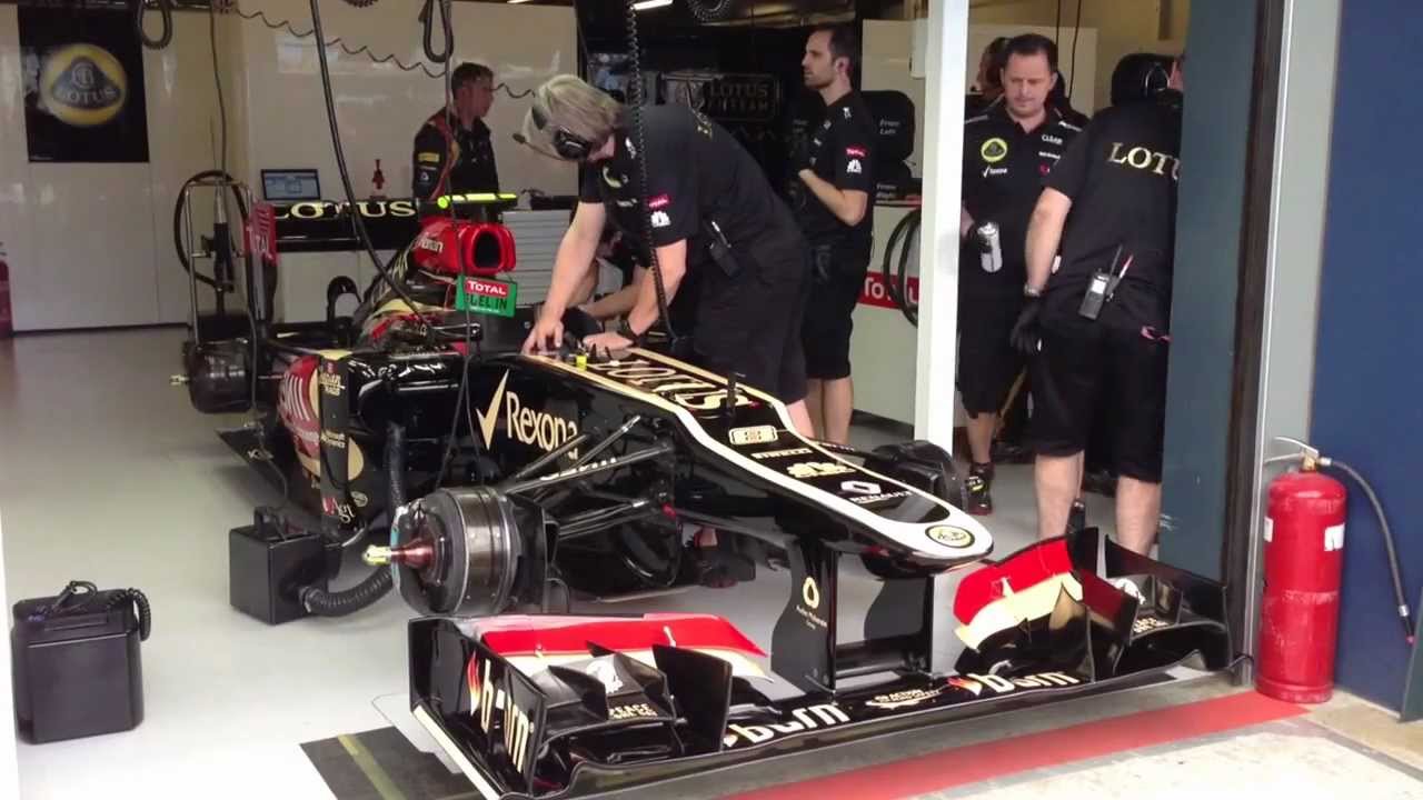 Lotus F1 car revving in pit