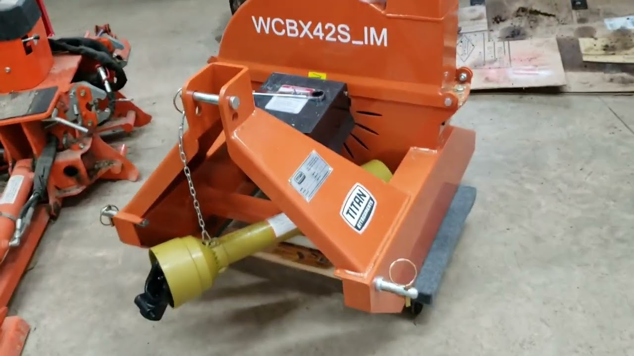 Titan Wood Chipper and Kubota BX23S  in Action