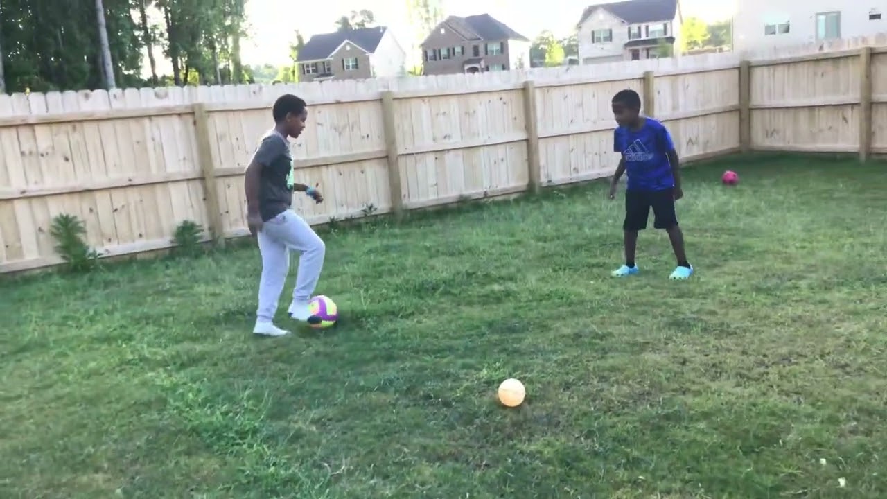 Duma kid kicked the ball over the fence