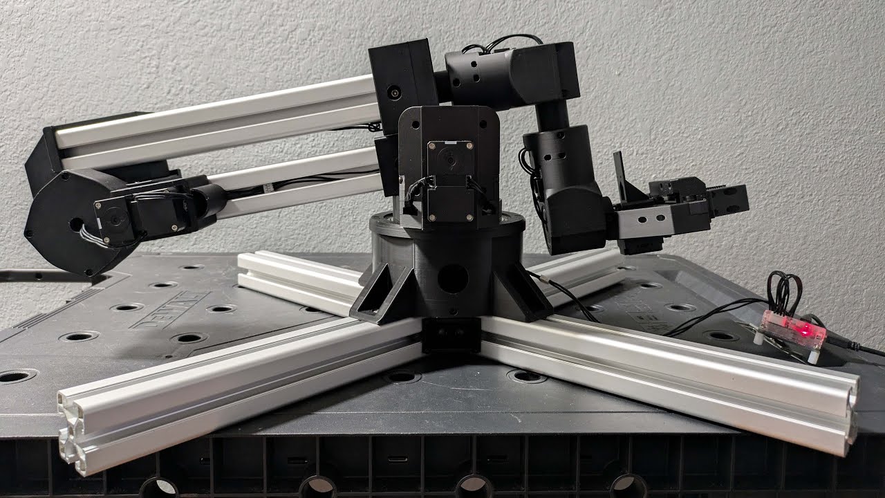 I built a relatively cheap robotic arm