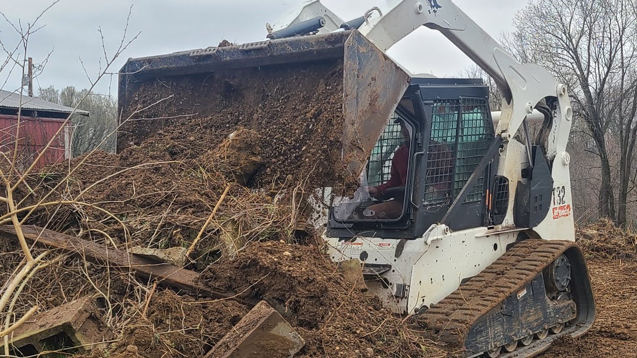 Clearing a Jungle of Cinder Blocks: Bobcat T320 Land Cleanup
