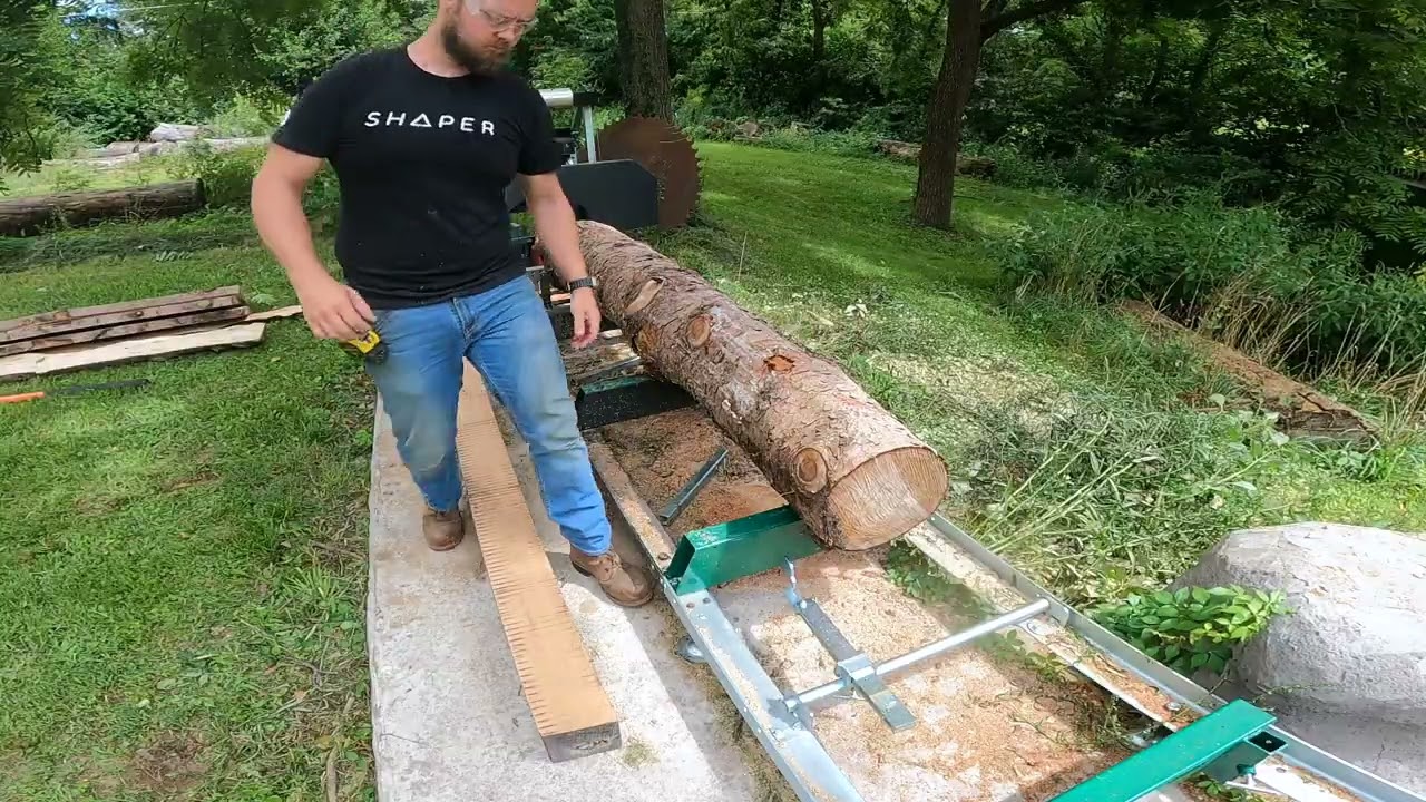 Sawing Pine logs for Local Builder