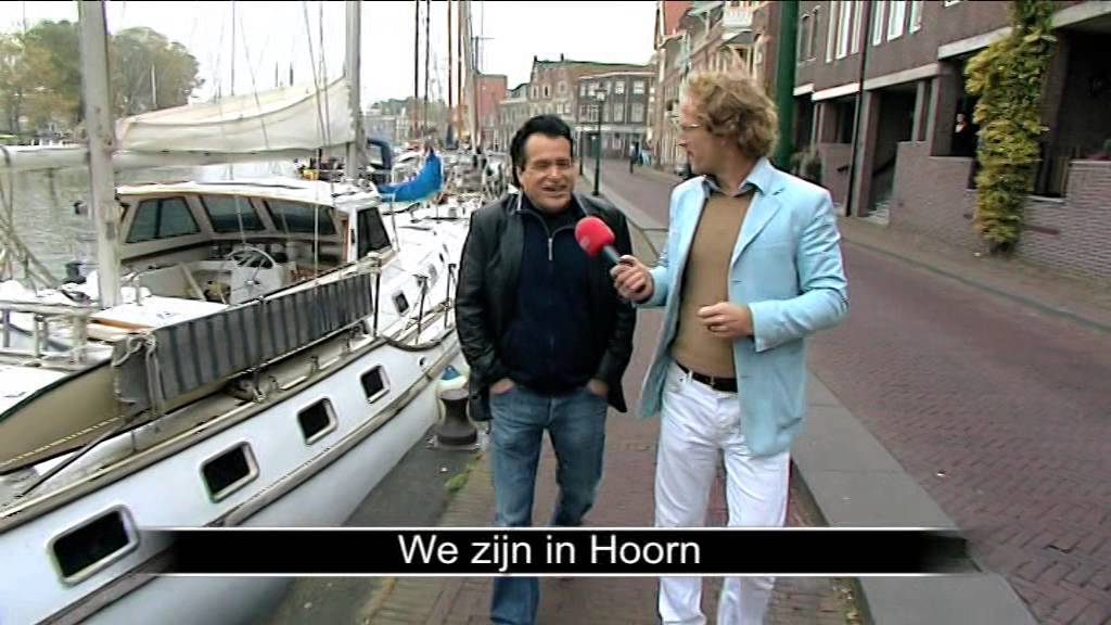 George Baker, Hans Bouwens alias George Baker, in gesprek met