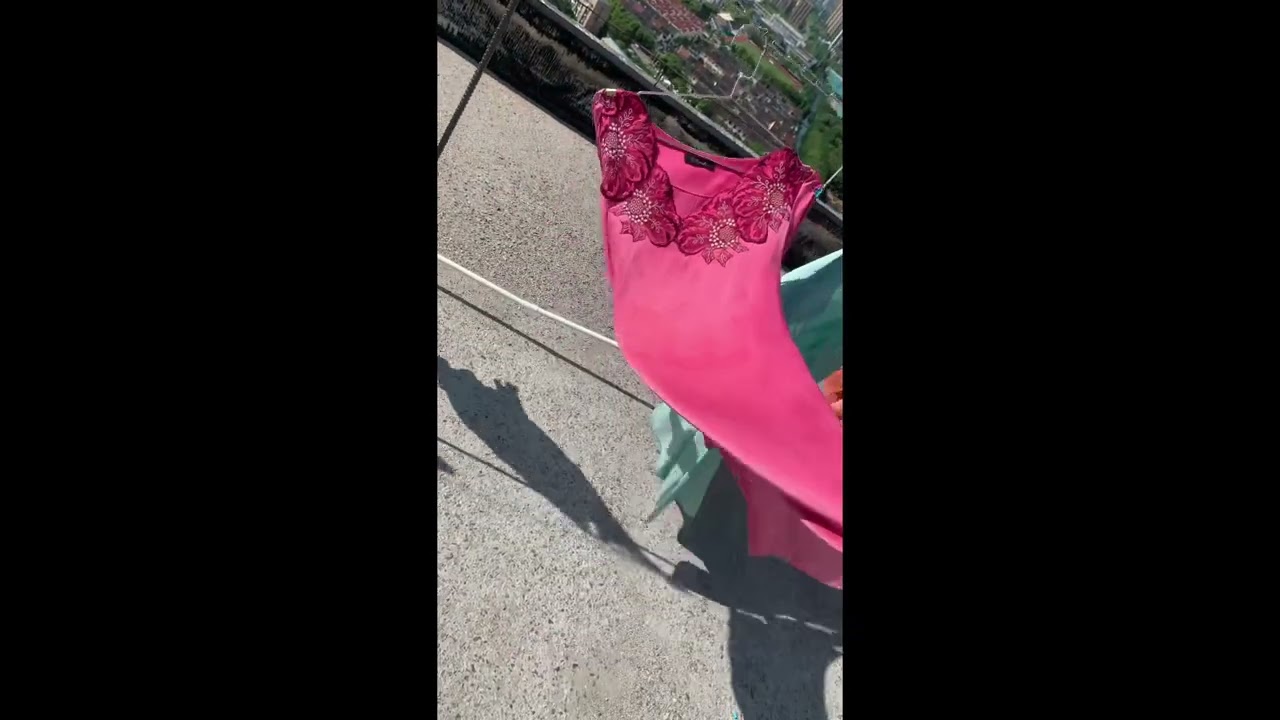 A pure silk dress torn apart in the wind