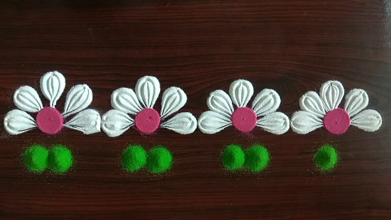 Flowers border rangoli by Art Basket