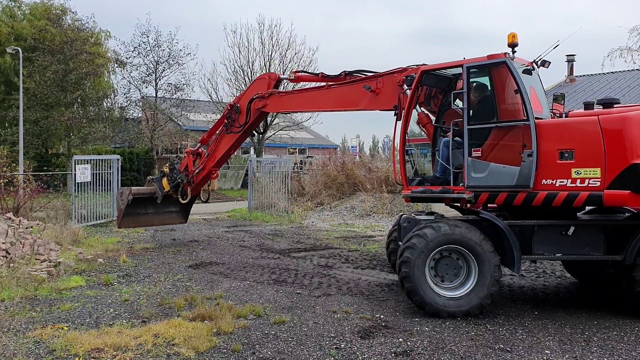 New Holland MH Plus Bandenkraan / Mobiele Graafmachine / Wheeled Excavator