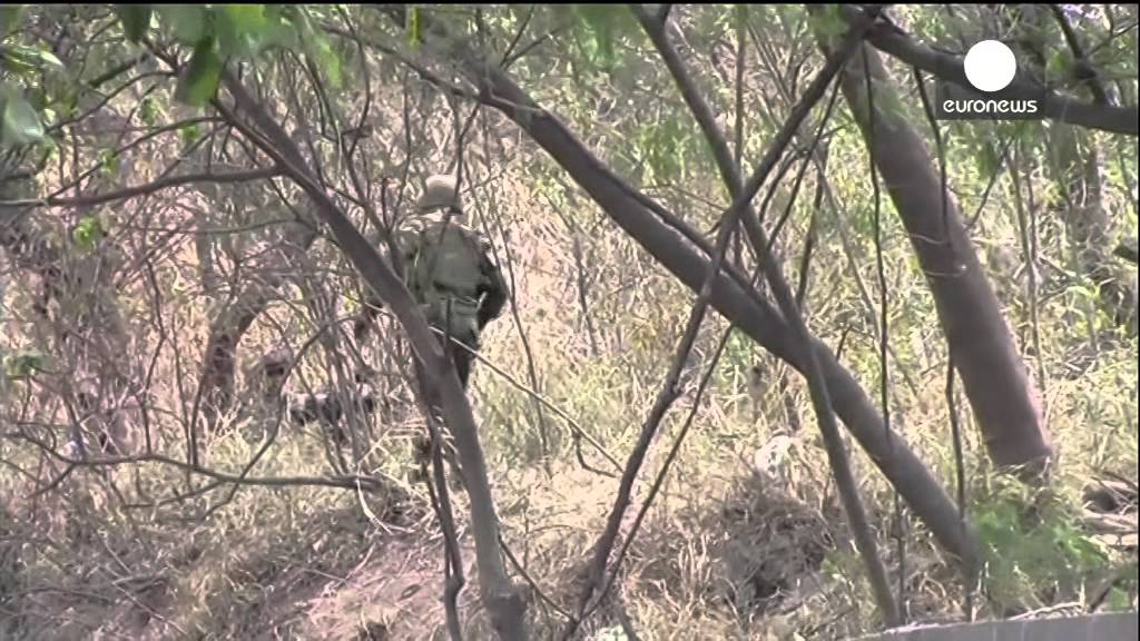 Caught on camera:  Soldiers and gang members in intense gunfight near Brazil favela