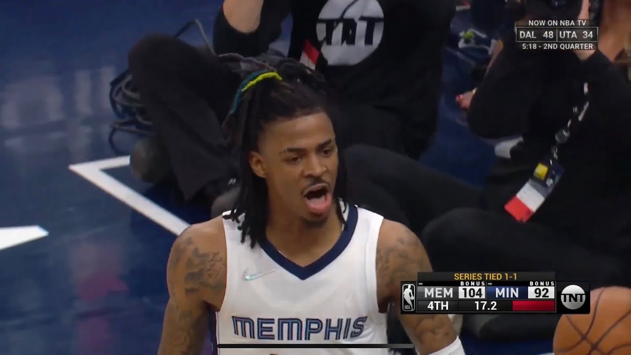 Ja Morant gets the block and talks smack to the Wolves fans!
