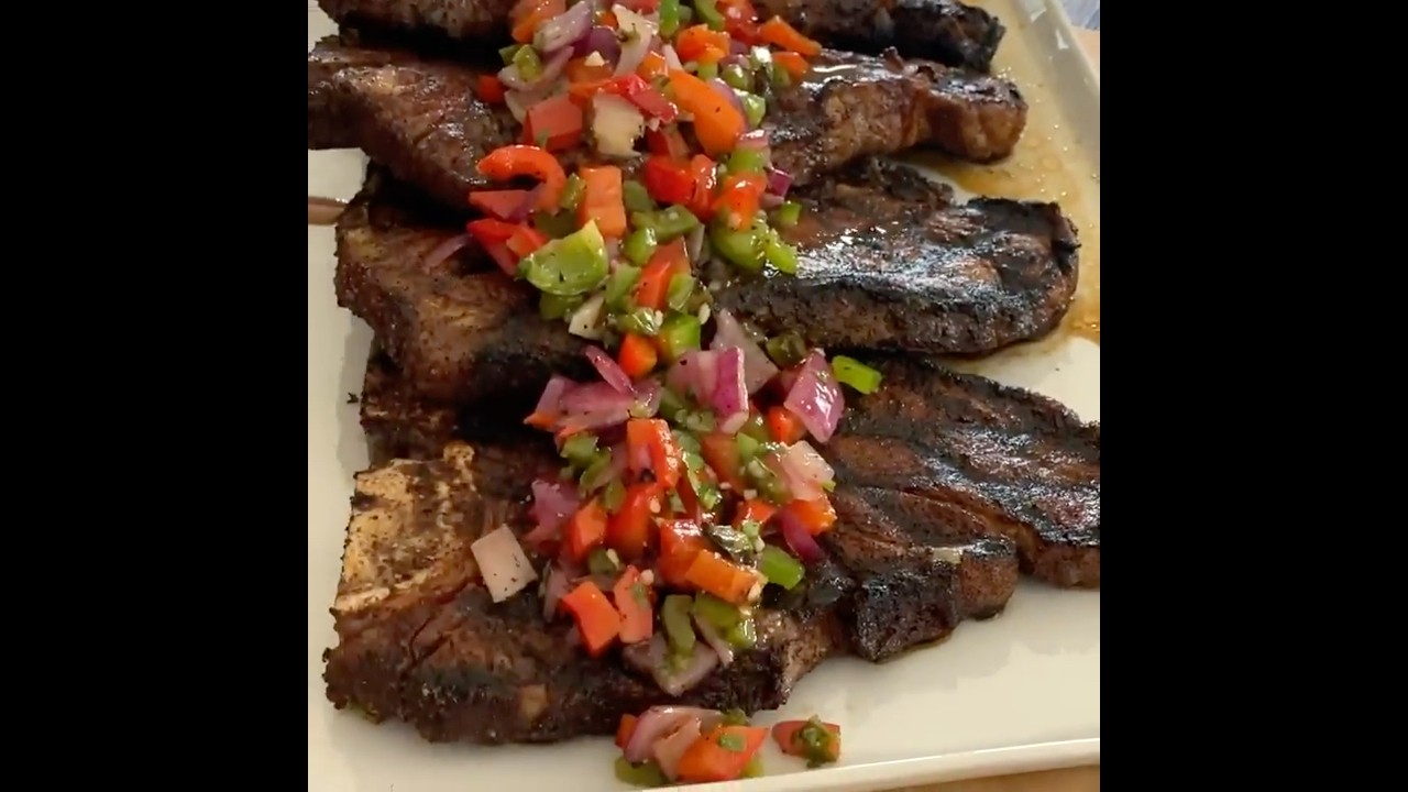 Ancho Chile-Rubbed Porterhouse with Grilled Pepper and Onion Salsa | Omaha Steaks