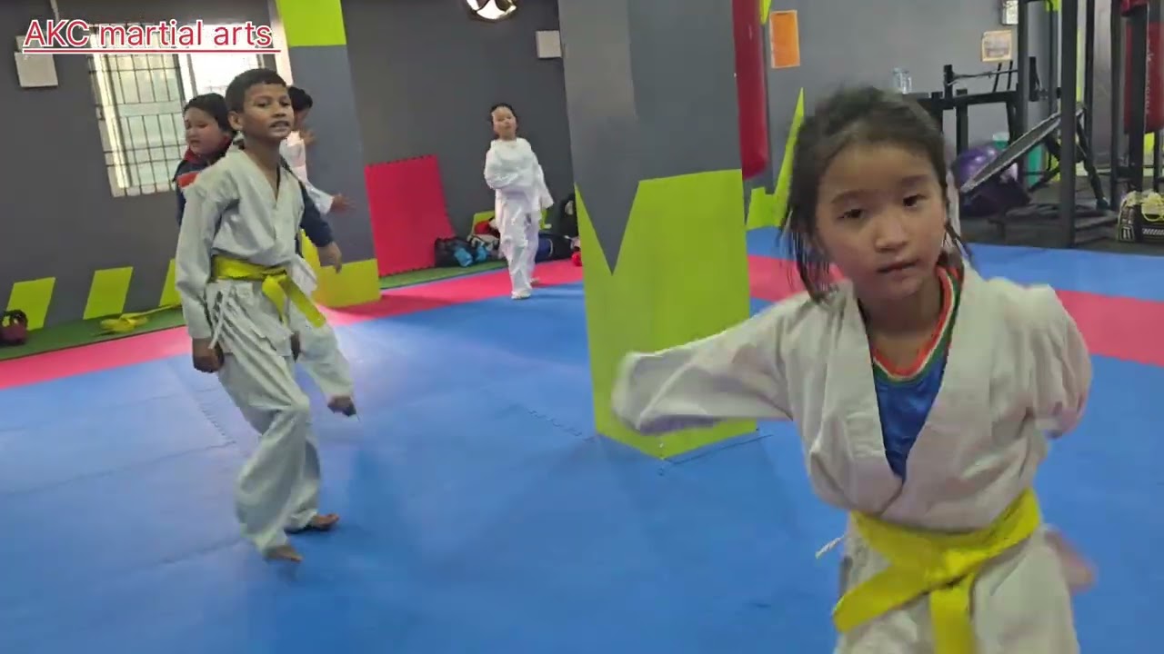 Karate kid's warming up exercise 