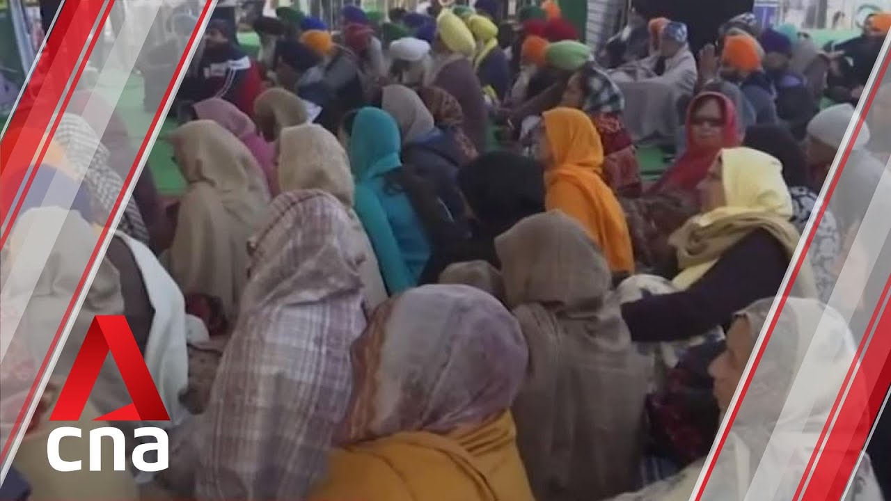 Women join front lines of farmer protests in India