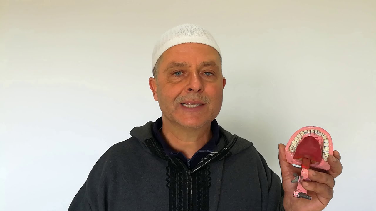 إتقان نطق حرف الراء: تجسيمها في لسان آلي و التدرب عليها