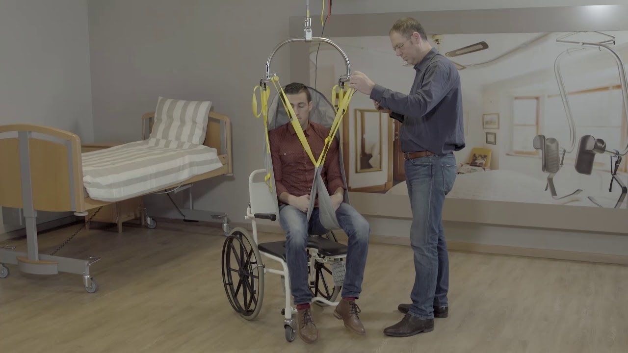 Handi-Move : using the standard sling and spreader bar, with wheelchair