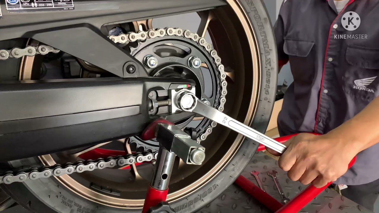 How to adjust the tension of your chain CB650r and Honda Rebel 500 (same process)