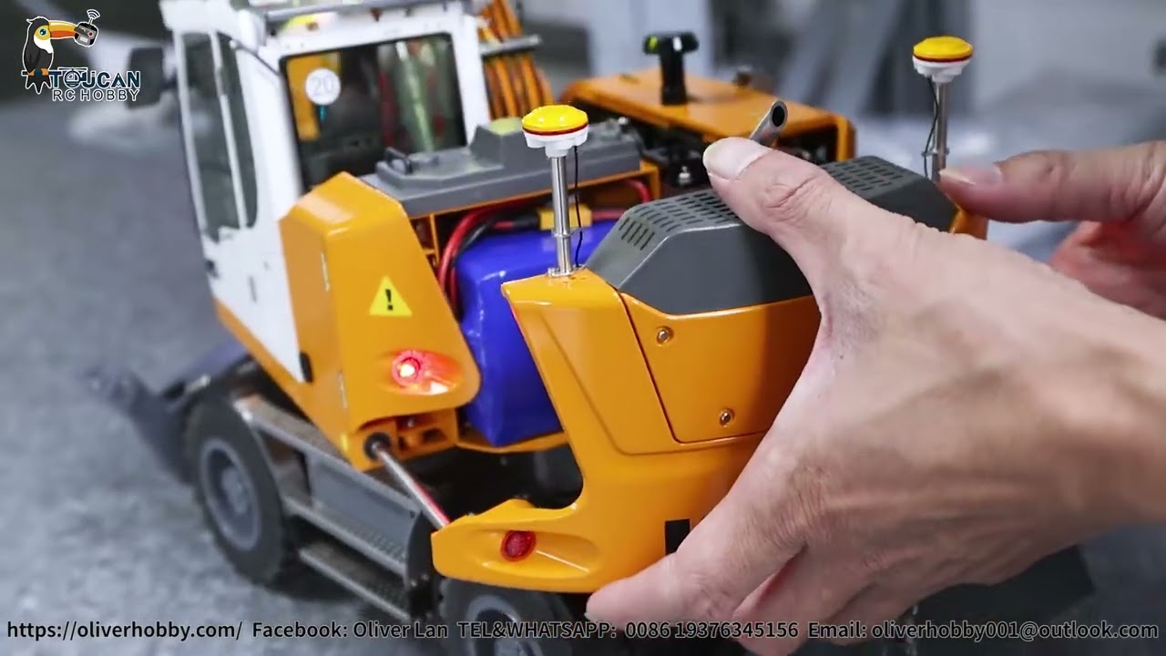 Detailed review of wheeled 1/14 RC 914 excavator, 3 arms, 7 valves with light & sound