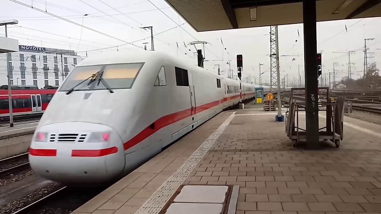 Zugverkehr in Nürnberg Hbf bei trüben, kühlem Wetter an einem Mittwoch Mittag / Nachmittag im Januar