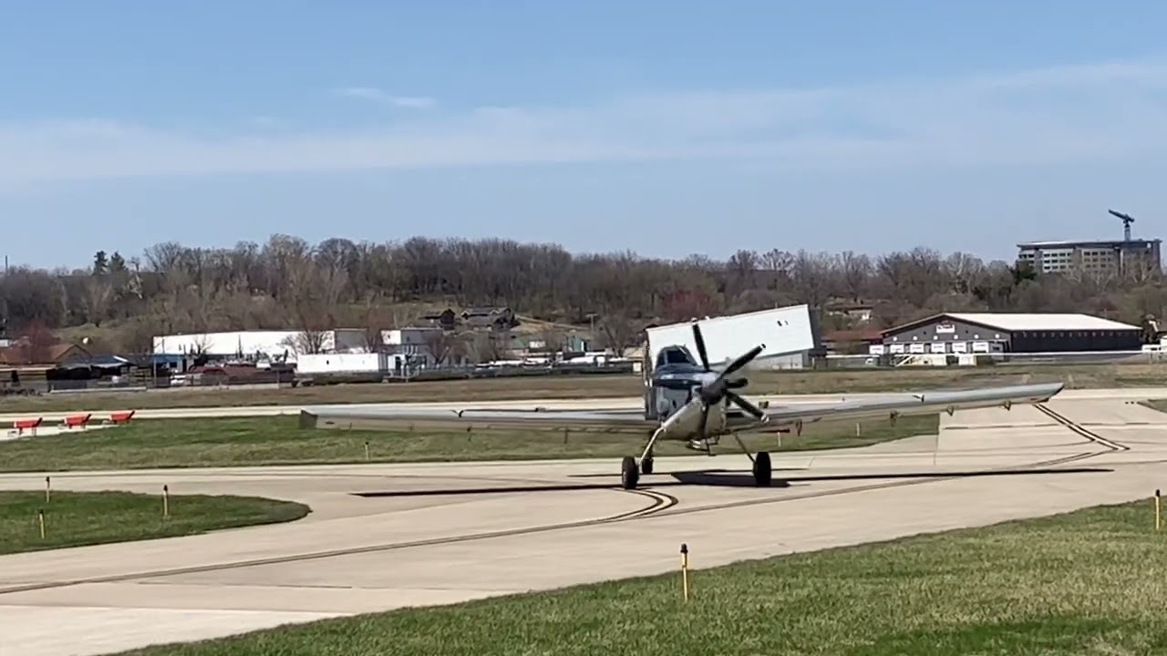 Vintage 1920s ford airplane takes of from Iowa city airport