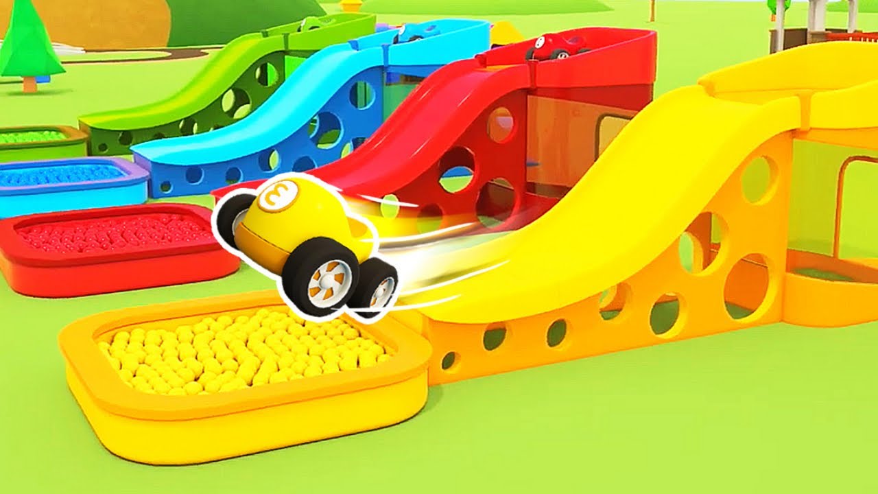 The racing cars are jumping to the ball pits and Helper cars help them with the street lights.