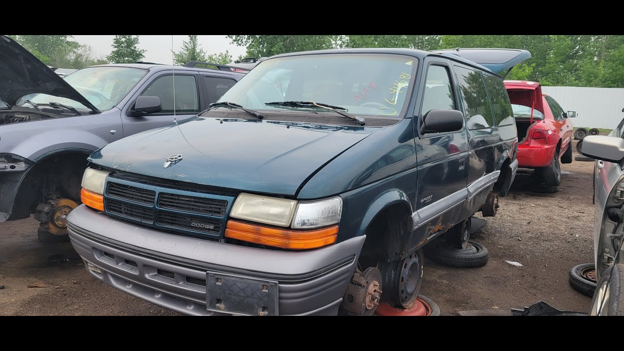 High mileage 1994 Dodge Grand Caravan Sport Wagon at U-Pull Salvage Yard in Minnesota