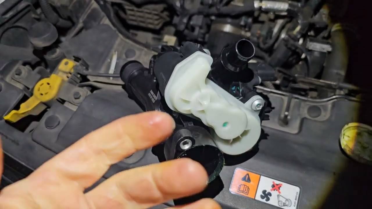 Boitier Thermostat Ford Kuga TDCI 2L fuite LR Remontage (Astuces et points cruciaux)