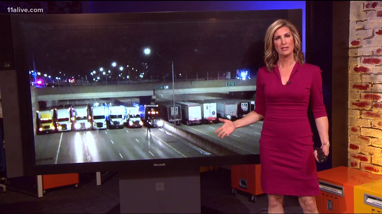 13 semi-trucks park on Interstate to protect man who wanted to jump off bridge