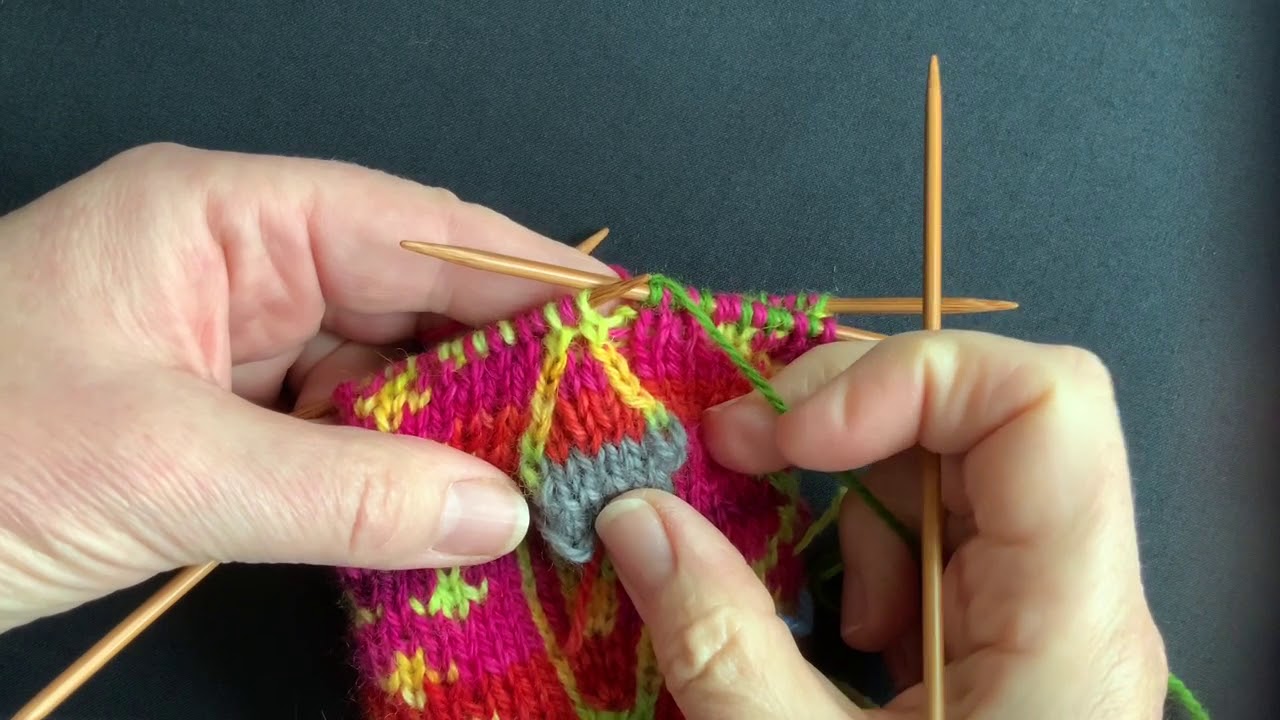Mitten Adventure 8 - Decreasing the extra stitches above the thumb hole