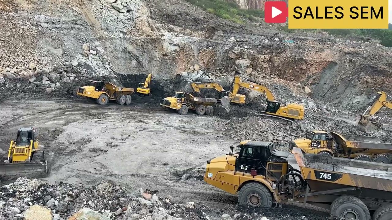CATERPILLAR ADT VS EXCAVATOR 352 CATERPILLAR