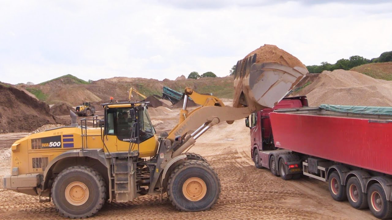 Komatsu WA500 Loading Scania And MAN Trucks