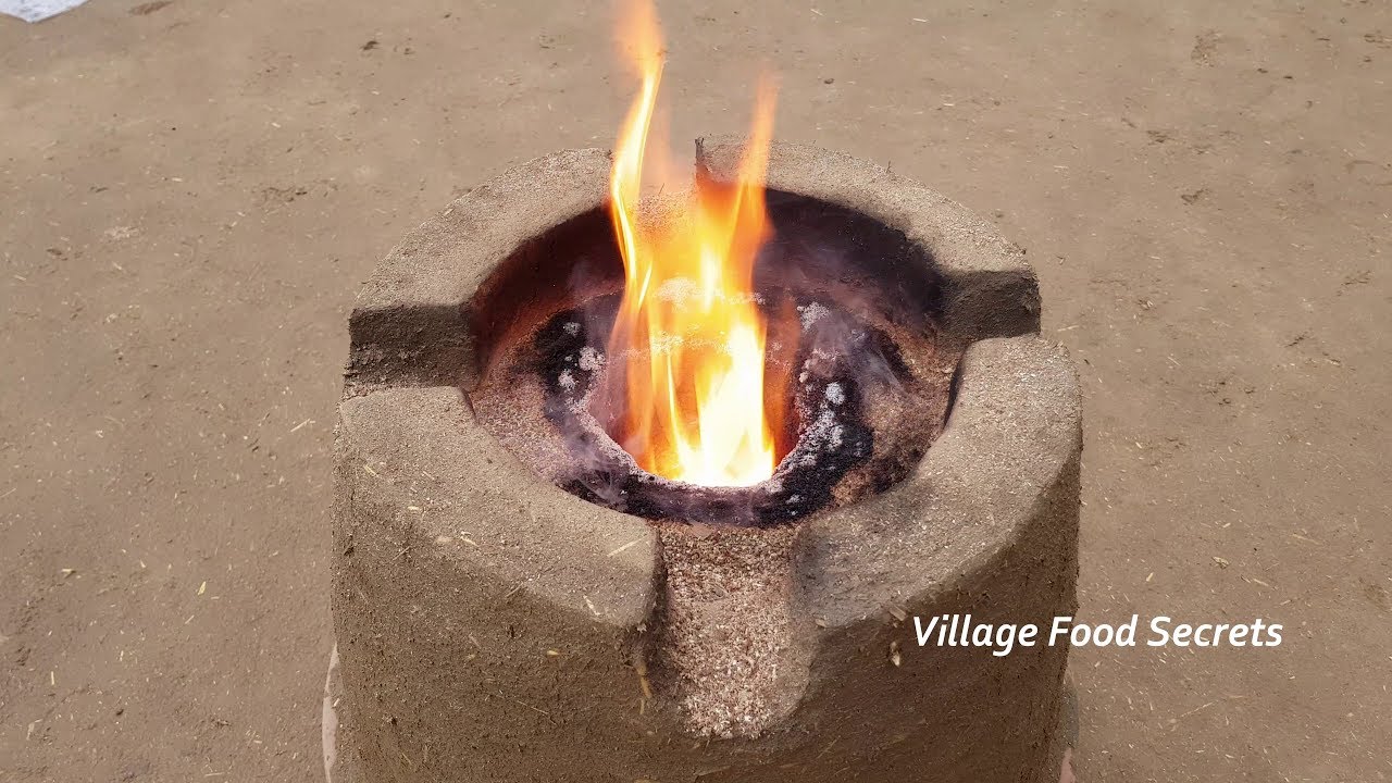 Sawdust Stove | Homemade Sawdust Burner | Homemade Wood Burning Rocket Stove | Village Food Secrets