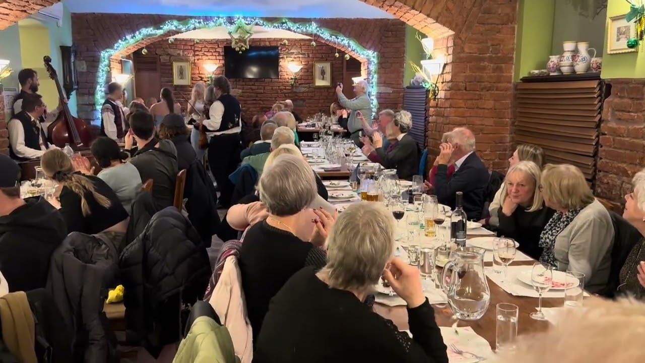 Fun Musical Hats Game - Czech Folklore Dinner at Restaurant Michal Old Town Prague - Elmbridge Choir