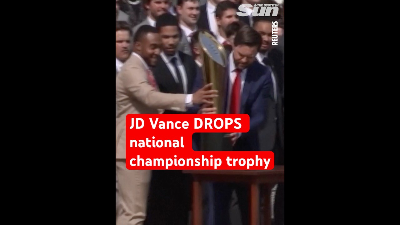 Donald Trump's vice-president JD Vance DROPS national championship trophy on college visit