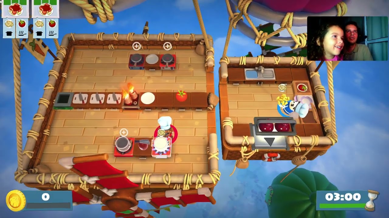 Rafaela e Thiago jogando Overcooked
