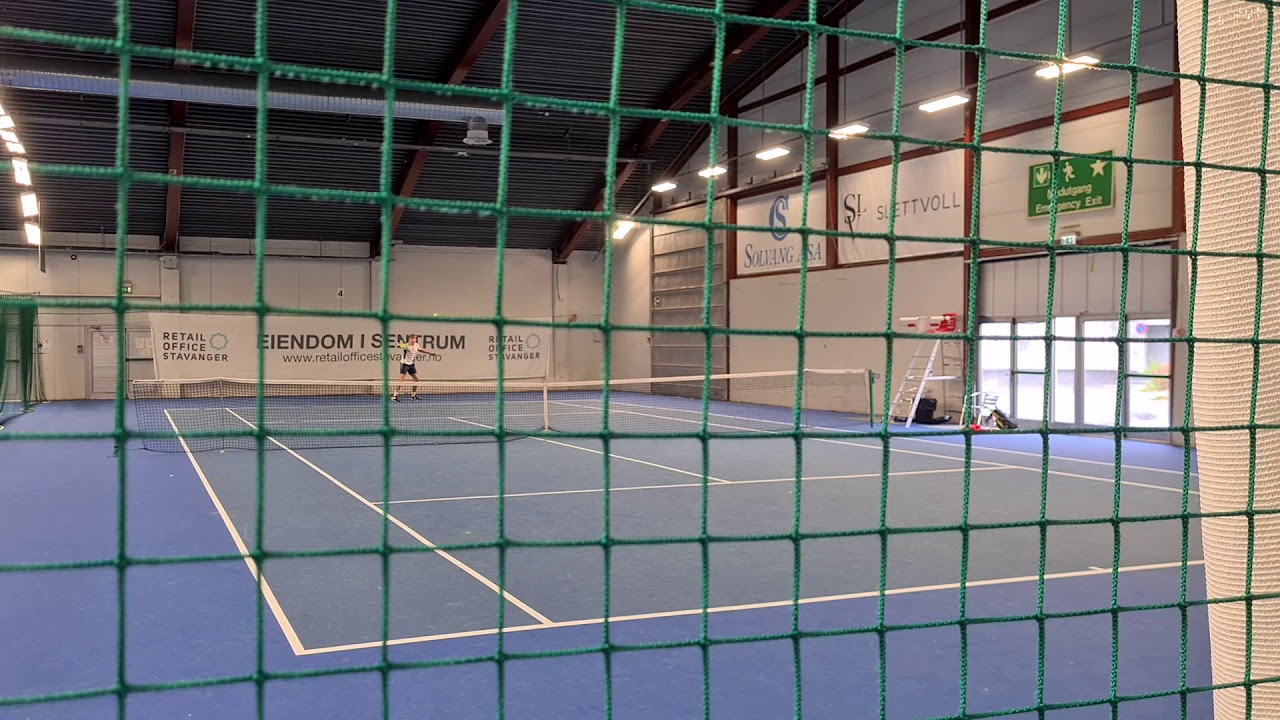 TennisDaniel  with a nasty slice against Stavanger Tennisklubb. Was it really out?