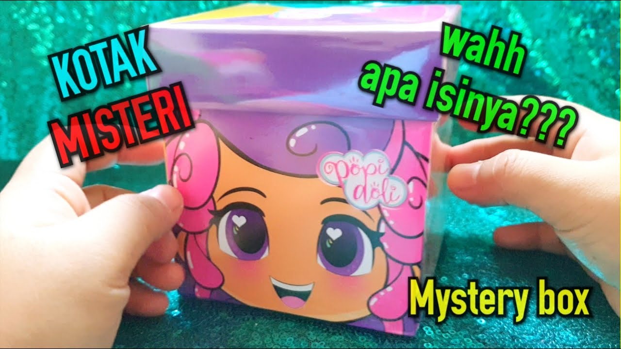 Kotak kado misteri Popi Doli