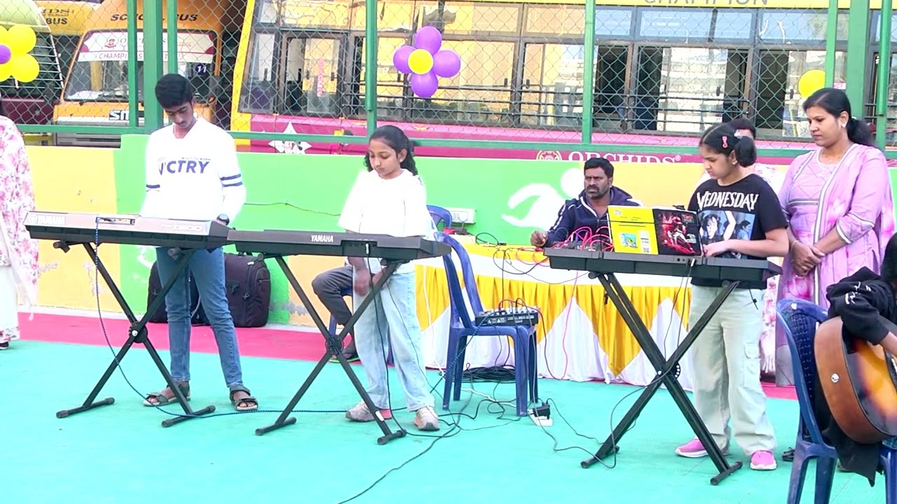 Guitar and keyboard class performance at LittleParrots Preschool Sports Day 2026