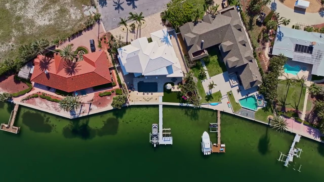 LUXURY WATERFRONT HOME | MICHAEL SAUNDERS & COMPANY | HOLMES BEACH, FL