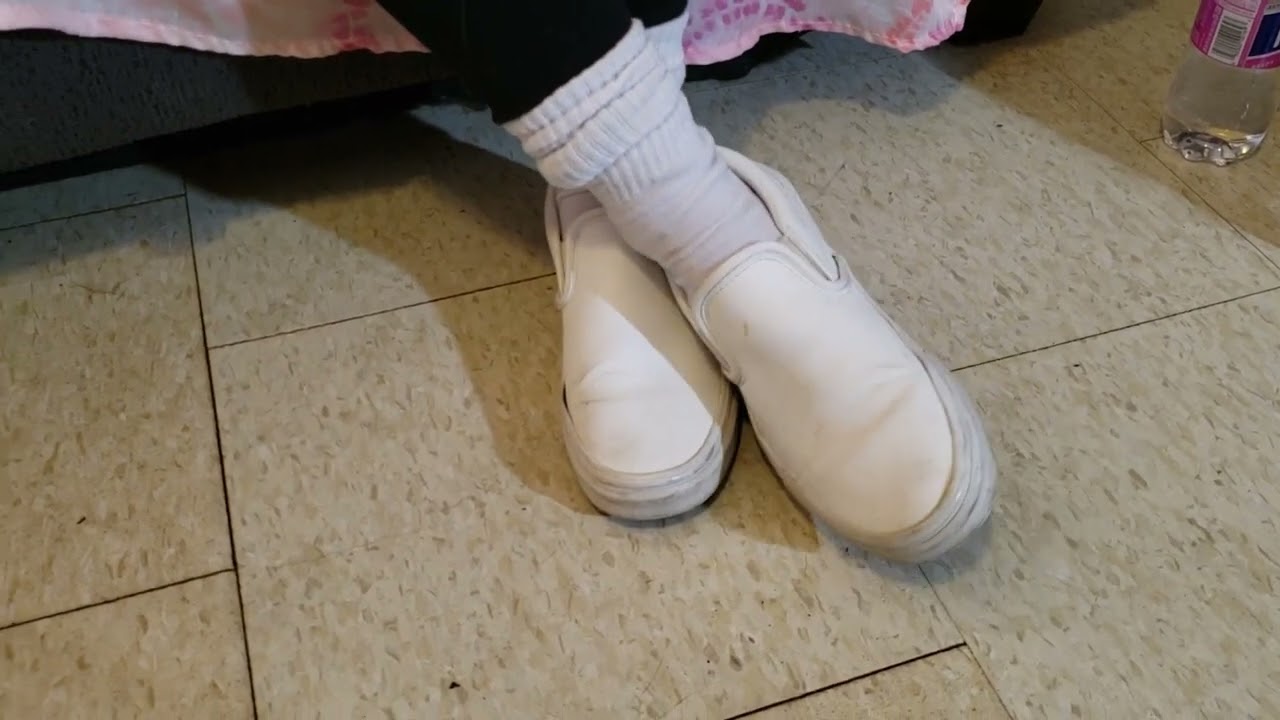 Elyse's white Vans